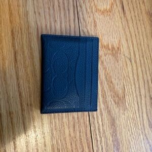 Small dark blue coach wallet